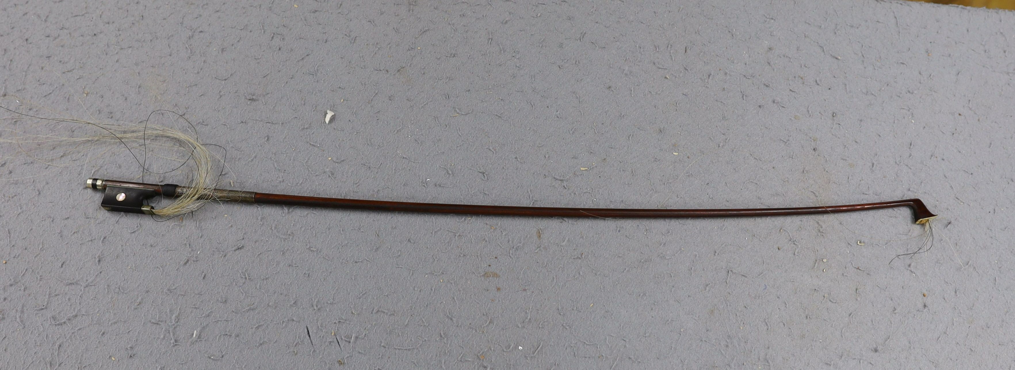 A cased 19th century violin, labelled Stradivarius 1690, with a Dodd bow